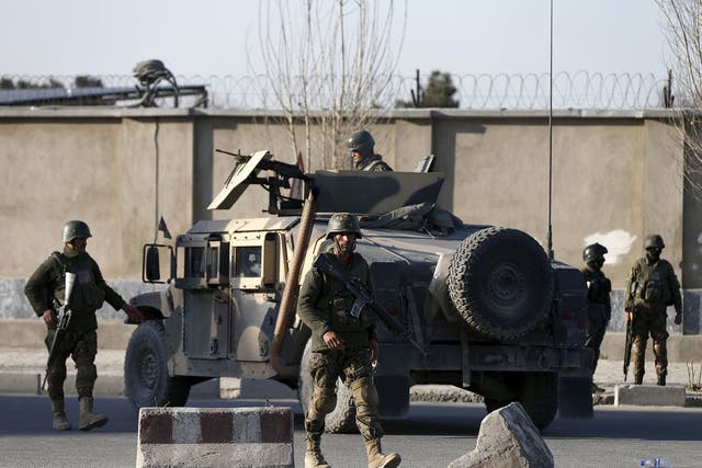 Afghan National Army soldiers arrive at the site of an attack in Kabul, Afghanistan, on 27 February, 2016