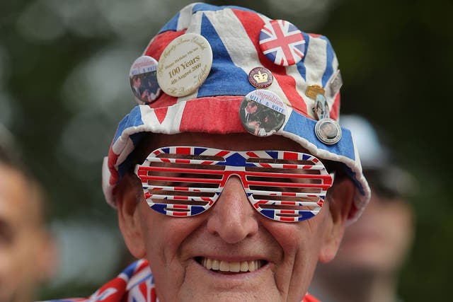 A nationalistic man shows his support for Britain at the Tour de France