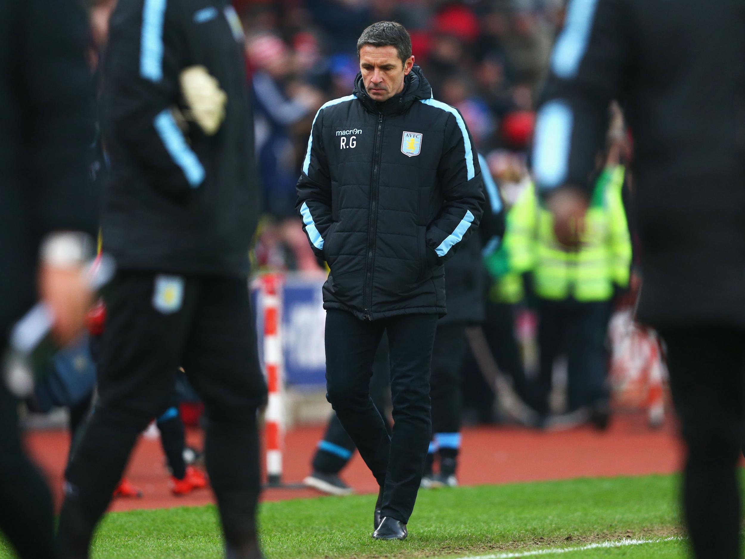 Remi Garde trudges to the tunnel