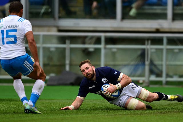 John Barclay slides over the line for his try.
