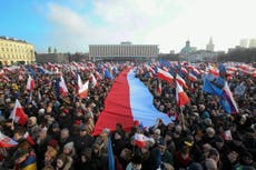 Anti-government protesters march in Warsaw 