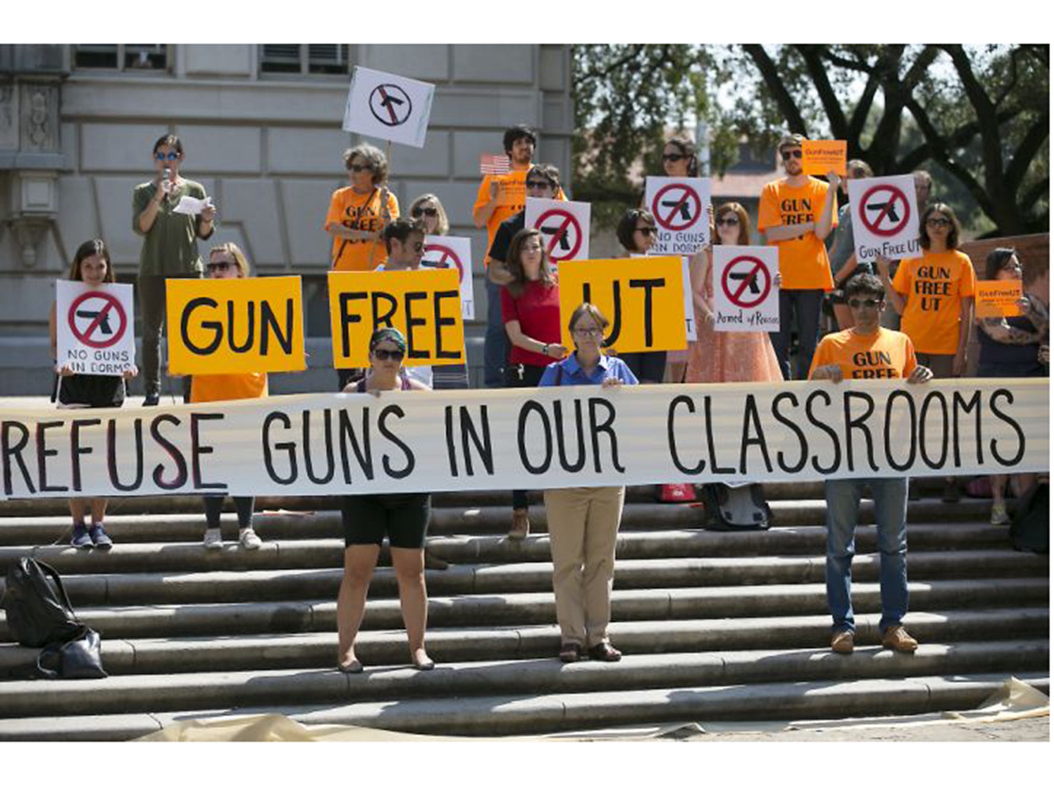 &#13;
Protesters gather at the University of Texas campus last year to oppose a new state law expanding the rights of concealed handgun license holders to carry their weapons on public college campuses &#13;