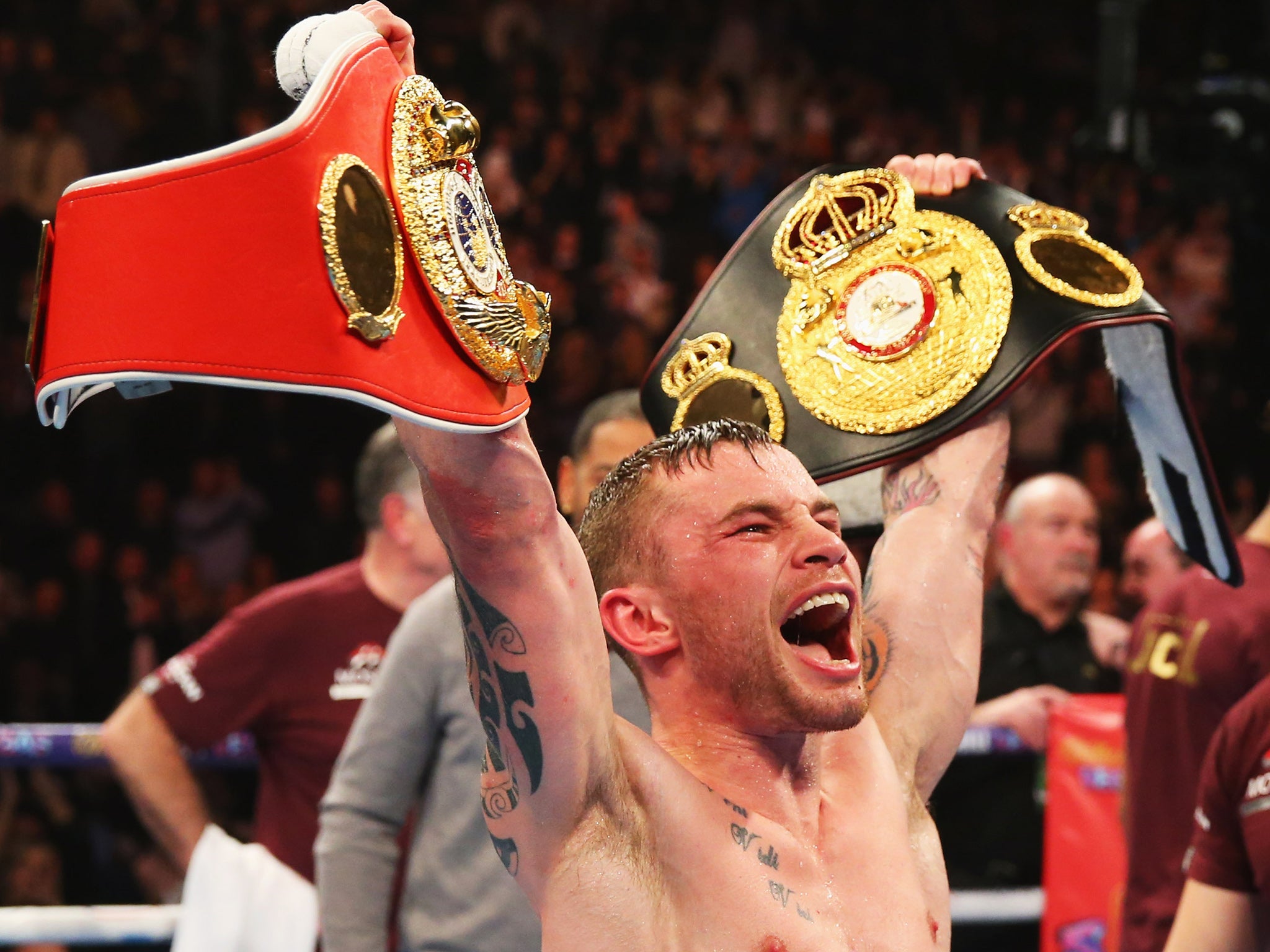 Carl Frampton holds his titles after beating Scott Quigg