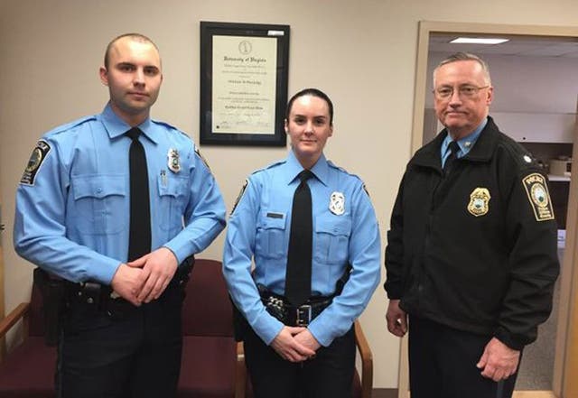 From left, Officer Steven Kendall, Officer Ashley Guindon, Lt. Col. Barry Bernard