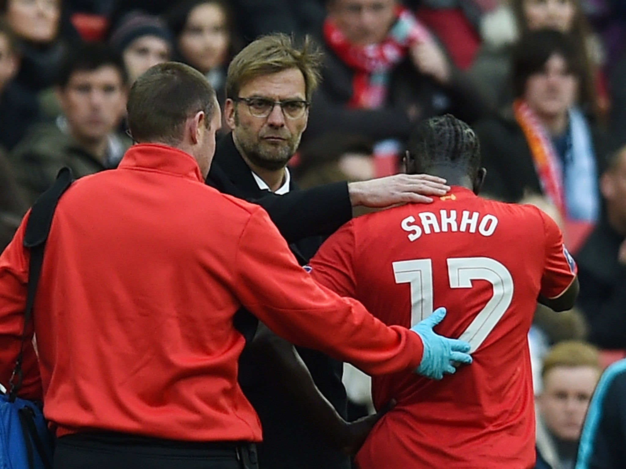 Liverpool defender Mamadou Sakho leaves the field at Wembley
