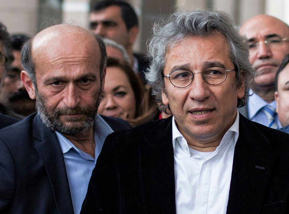 A court ruled Can Dundar, right, and Erdem Gul and been unfairly jailed