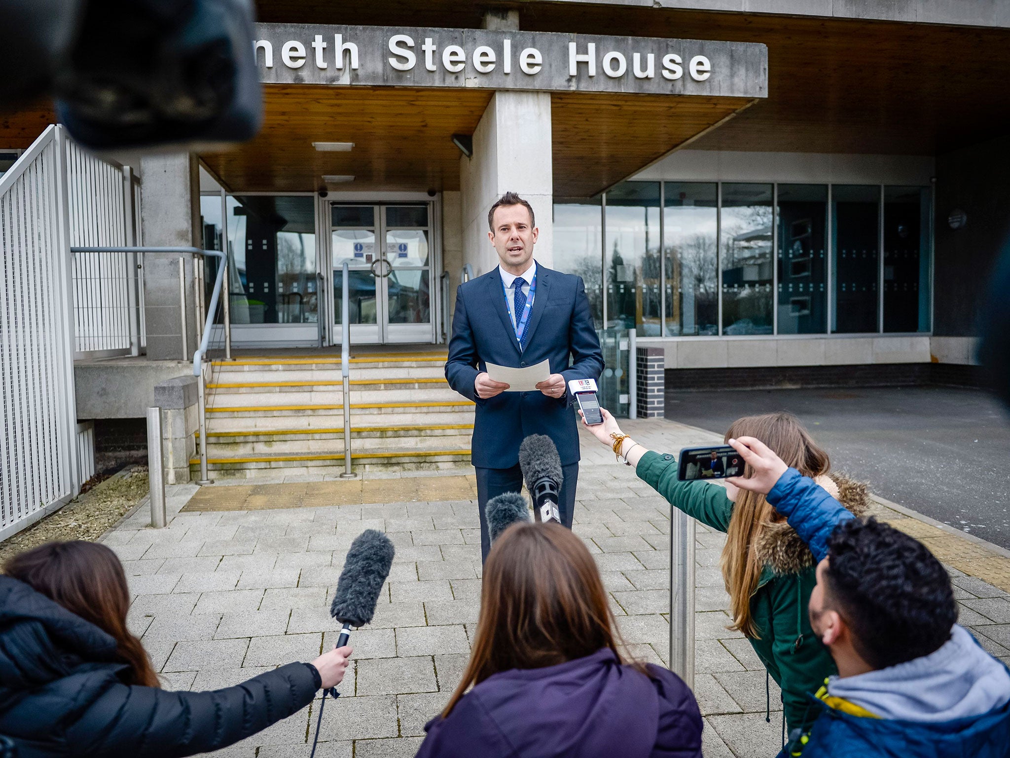 Detective Inspector Richard Pegler gives a statement to the press outside Kenneth Steele House, Bristol