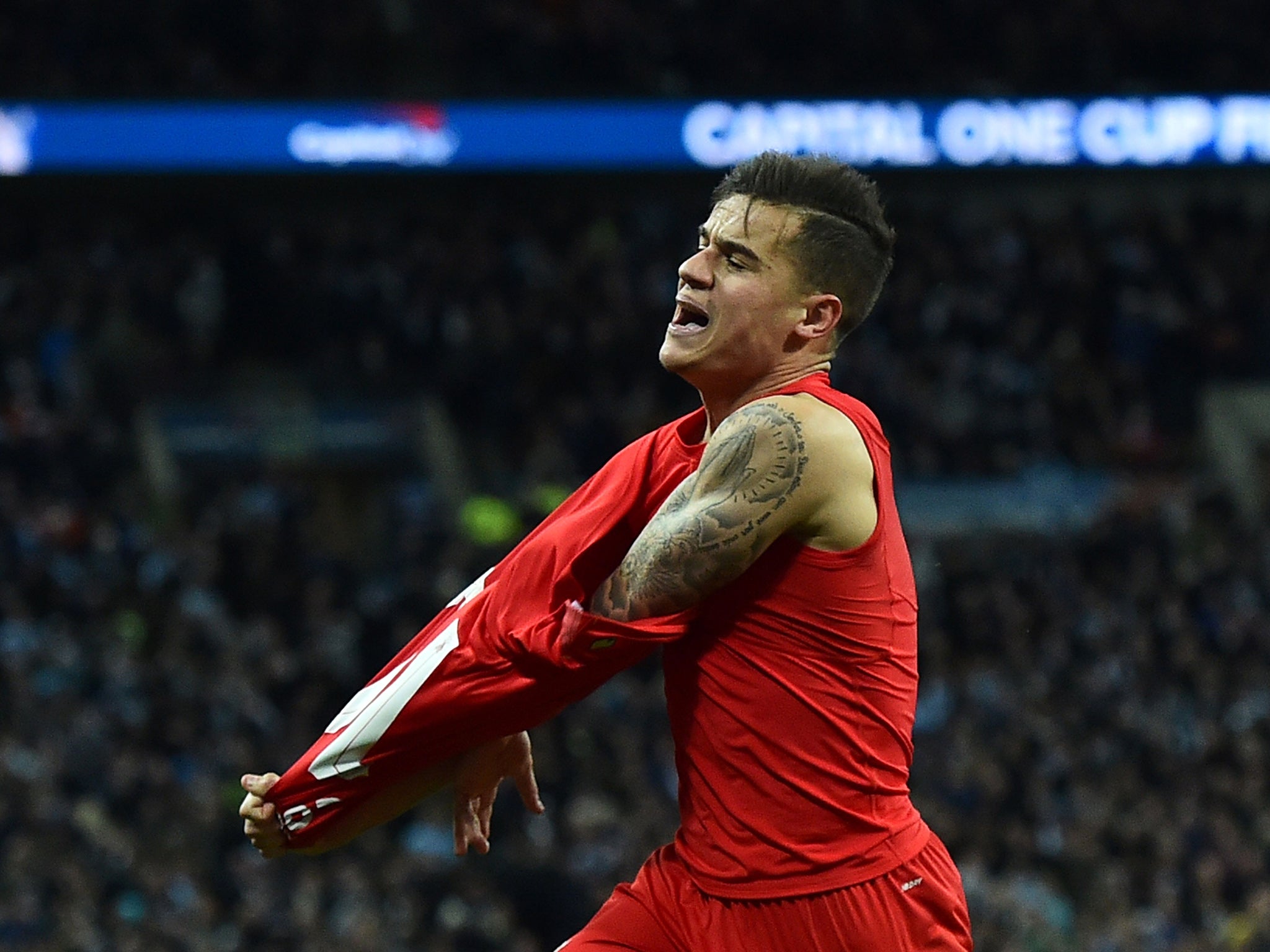 Philippe Coutinho celebrates his late equaliser