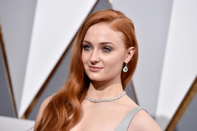 Sophie Turner walking the red carpet at the 88th Academy Awards
