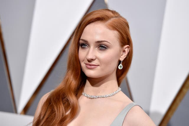 Sophie Turner walking the red carpet at the 88th Academy Awards