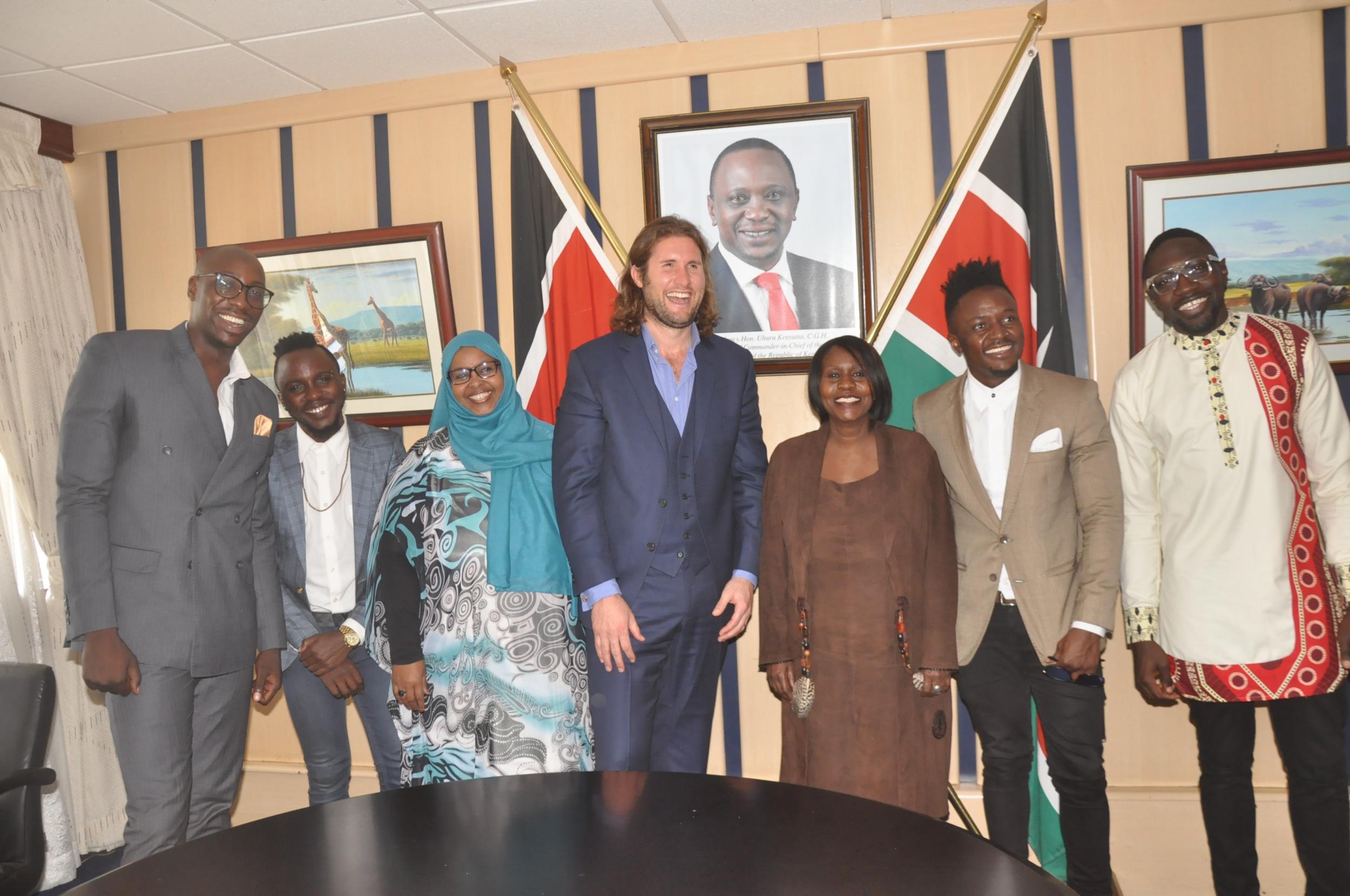 Professor Max Graham and Environment Secretary Judi Wakhungu (centre), flanked by the Kenyan pop phenomena Sauti Sol