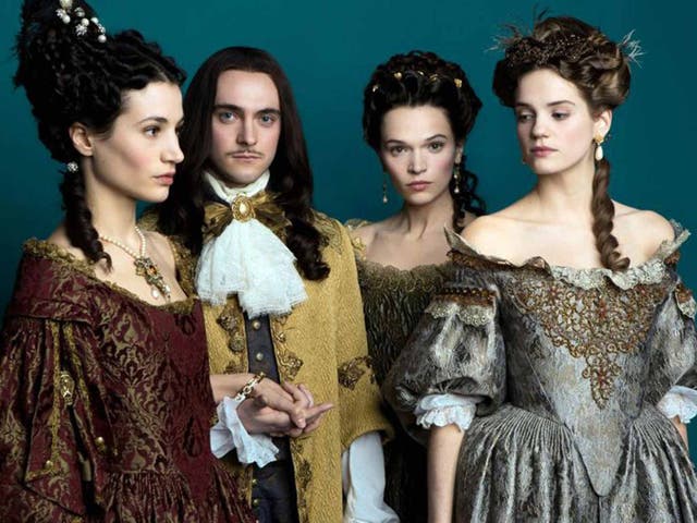 Court in the act: George Blagden, as Louis XIV, with three of his leading ladies