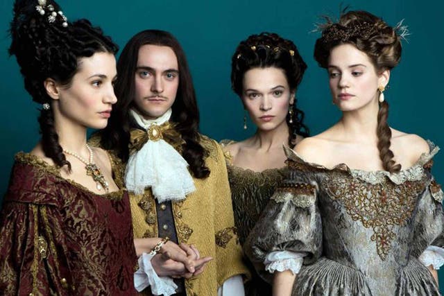 Court in the act: George Blagden, as Louis XIV, with three of his leading ladies