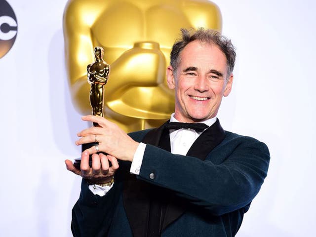 Mark Rylance clutches his Best Supporting Actor Oscar for his role in ‘Bridge of Spies’
