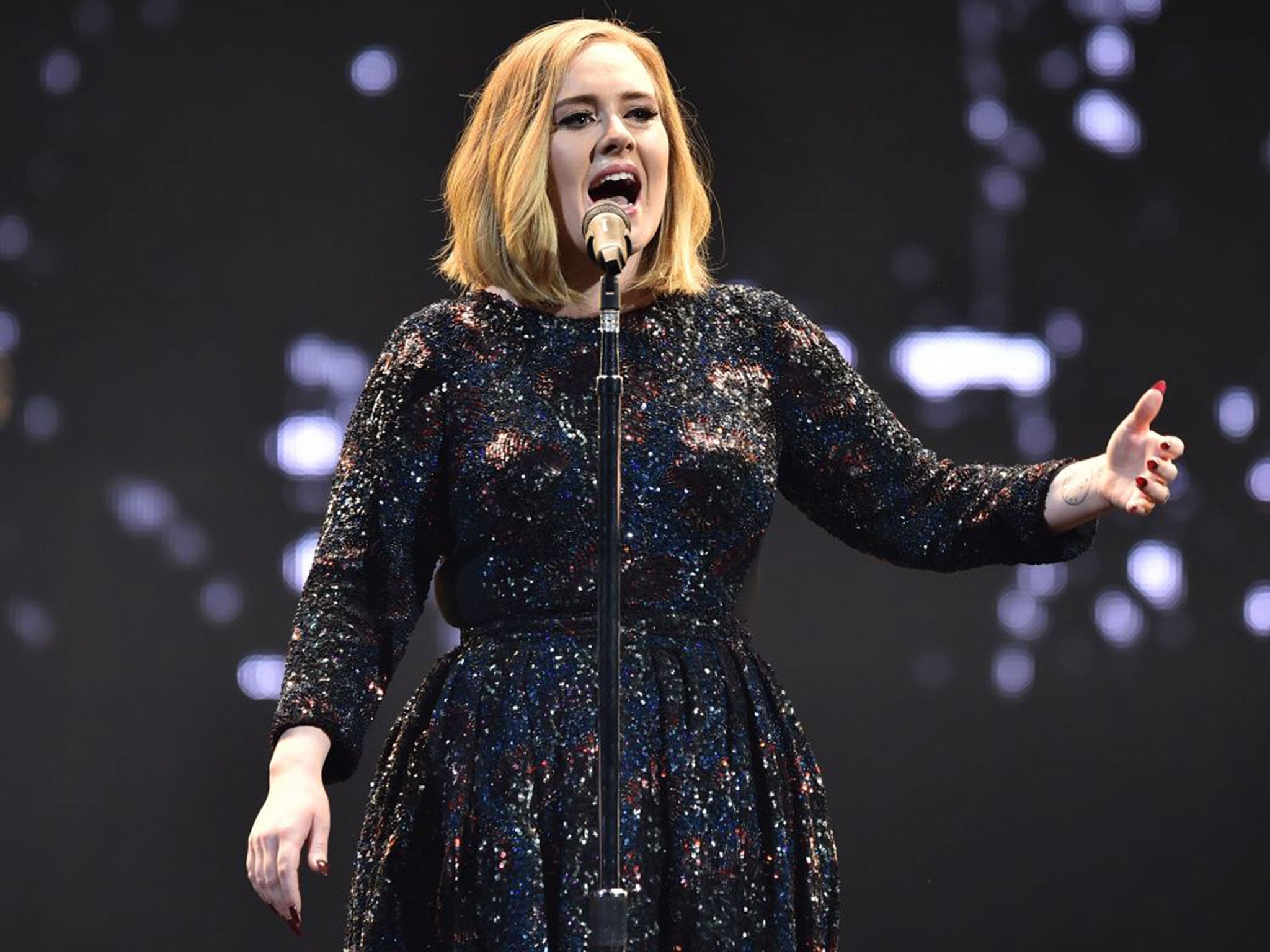 Safety in numbers: Adele performs in Belfast on the first date of her UK tour