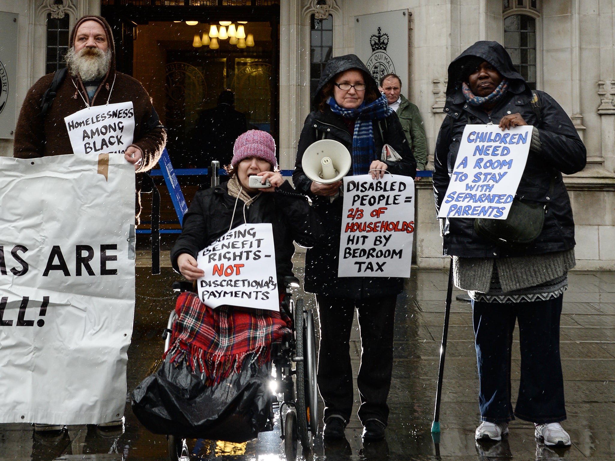 Protestors outside the Supreme Court raise their concerns about the impact of the bedroom tax on households with a disabled member