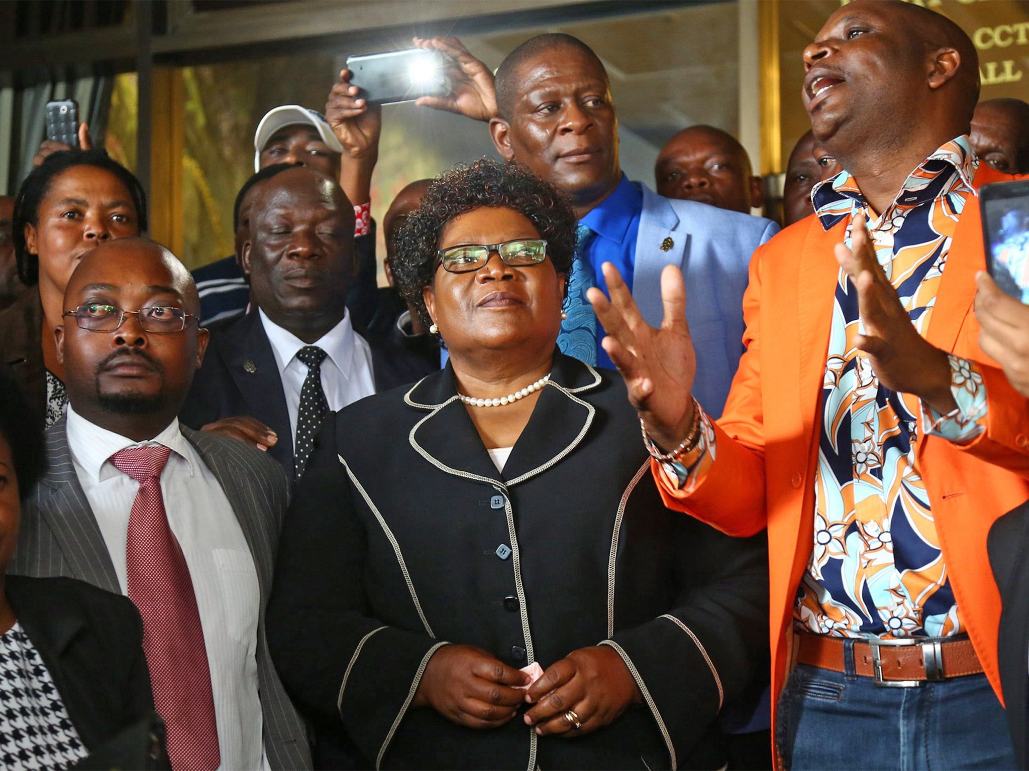 Zimbabwe’s former Vice-President Joice Mujuru with supporters at a press conference in Harare