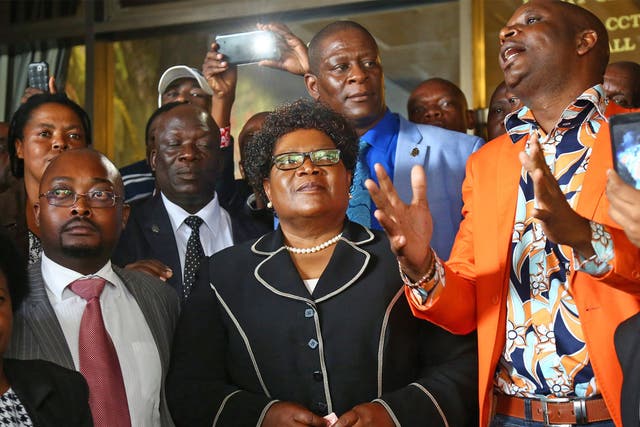 Zimbabwe’s former Vice-President Joice Mujuru with supporters at a press conference in Harare