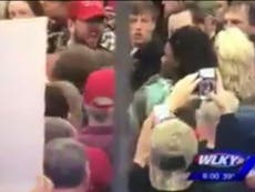 Read more


Donald Trump supporters push and shove young black woman at rally