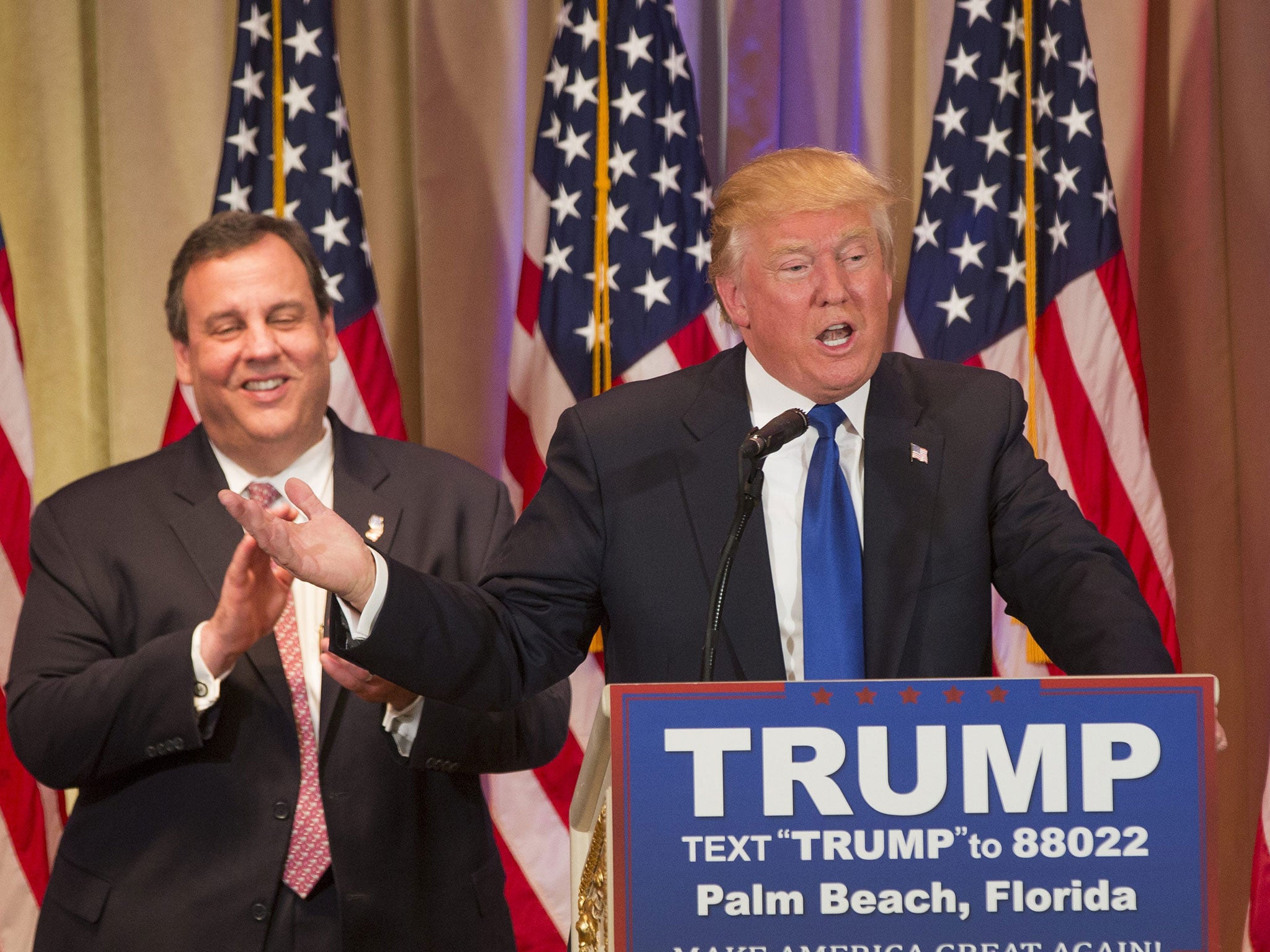 <p>Donald Trump speaks, after being introduced by New Jersey Governor Chris Christie (L), at a Super Tuesday campaign event in Palm Beach, Florida</p>