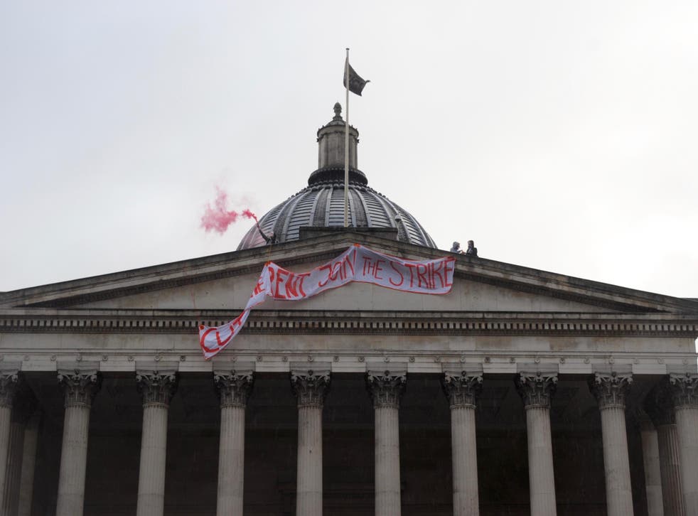 UCL Cut the Rent activists drop a banner from the roof of the Wilkins Portico, UCL's main building