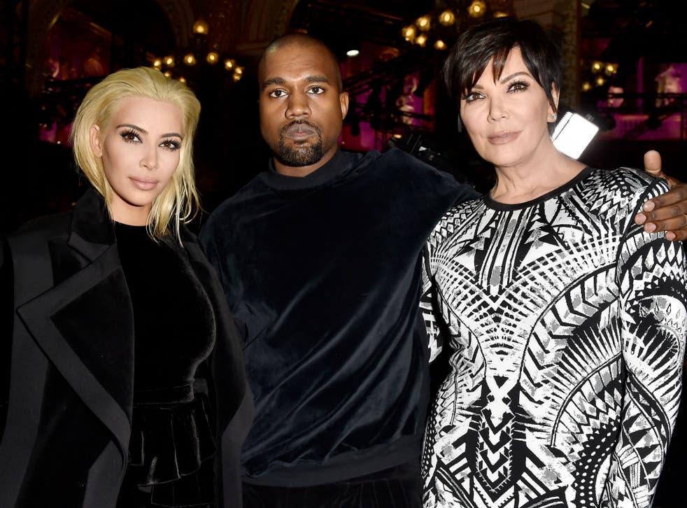 Kim Kardashian with her husband Kanye West and mother Kris Jenner