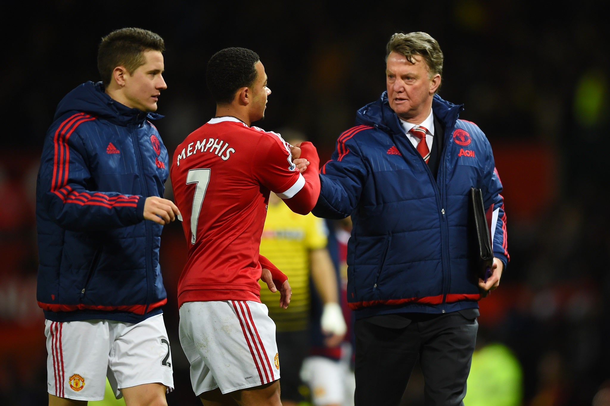 Louis van Gaal shakes hands with Memphis Depay after Manchester United's 1-0 win over Watford