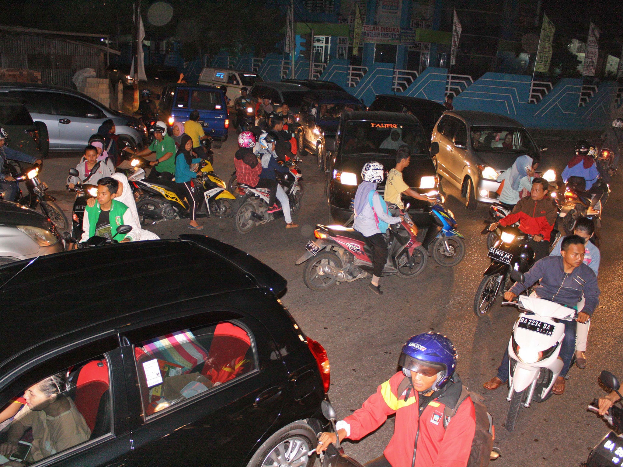 Some of the chaotic scenes as people in Padang, Sumatra, fled to higher ground could have been avoided