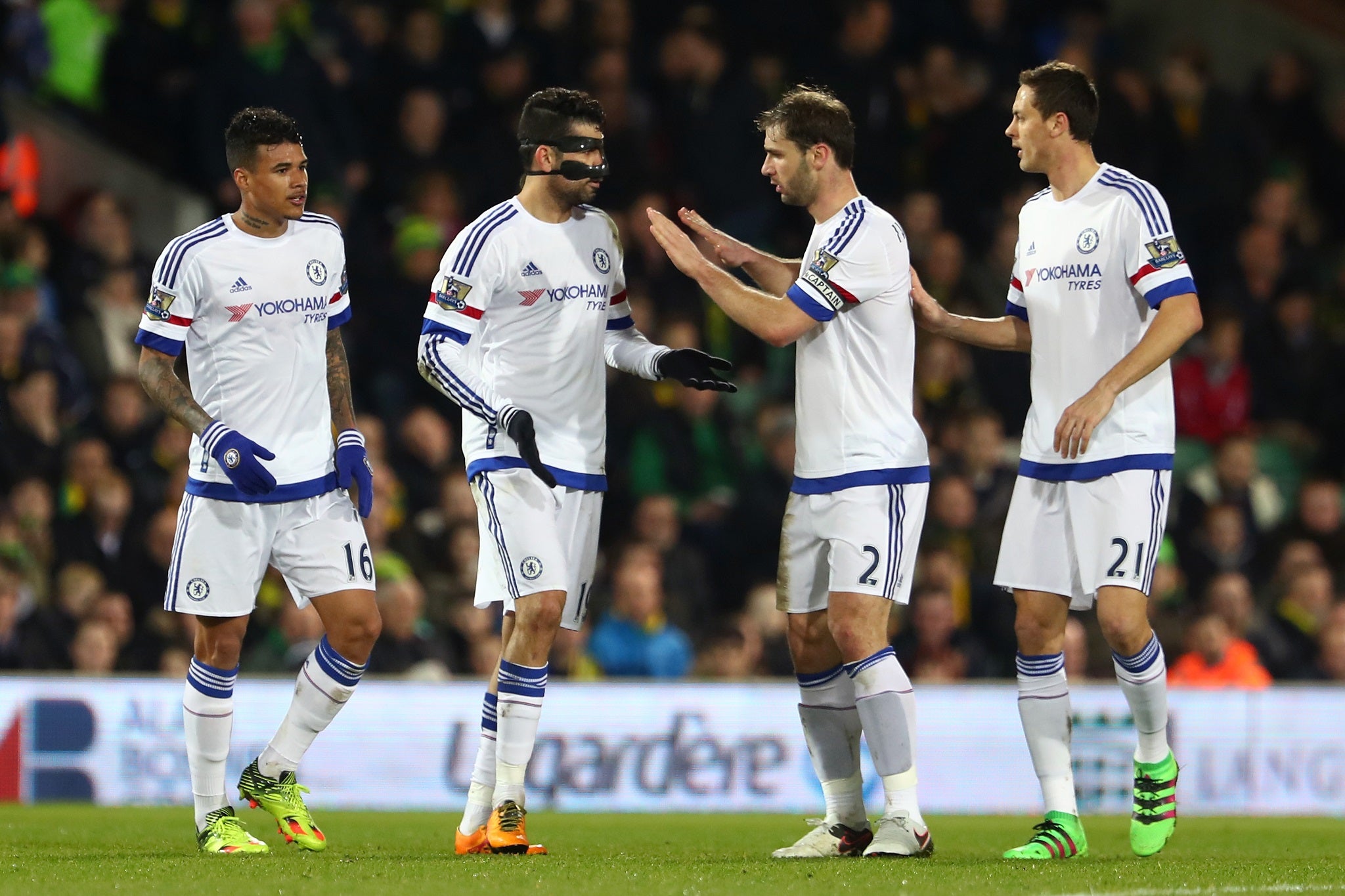 Diego Costa celebrates with Kenedy, Branislav Ivanovic and Nemanja Matic after scoring against Norwich