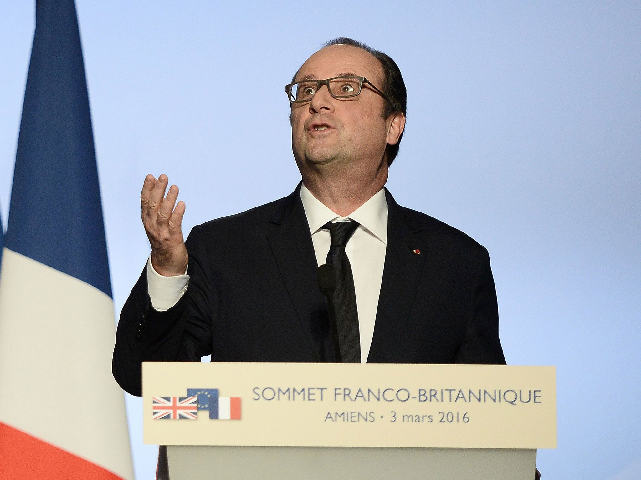 French President Francois Hollande gives a press conference at the Musee de Picardie in Amiens, northern France, during the 34th Franco-British summit