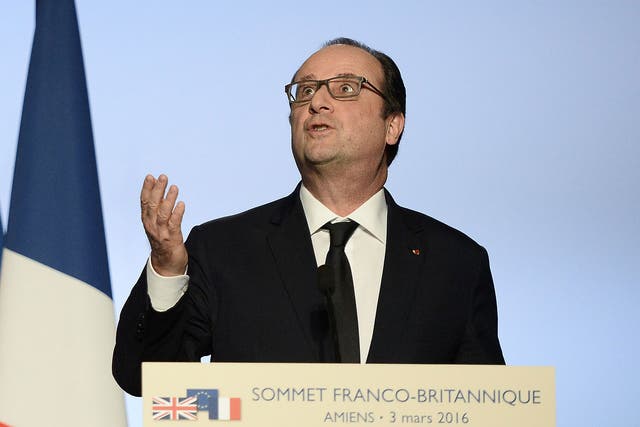French President Francois Hollande gives a press conference at the Musee de Picardie in Amiens, northern France, during the 34th Franco-British summit