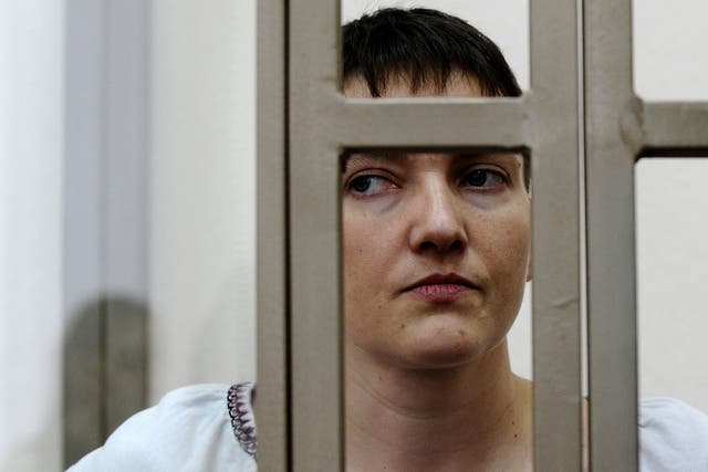 Nadiya Savchenko in a glass cage at her trial