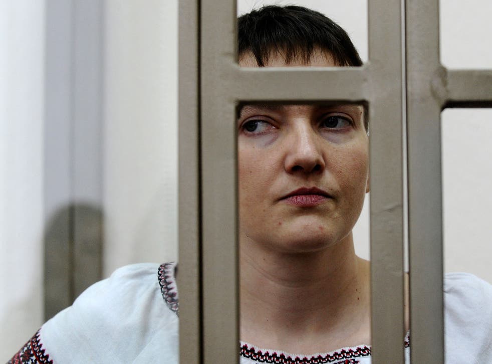 Nadiya Savchenko in a glass cage at her trial