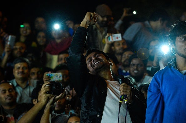 Mr Kumar, centre, shouts slogans as he addresses thousands of students and activists at JNU in New Delhi on 3 March