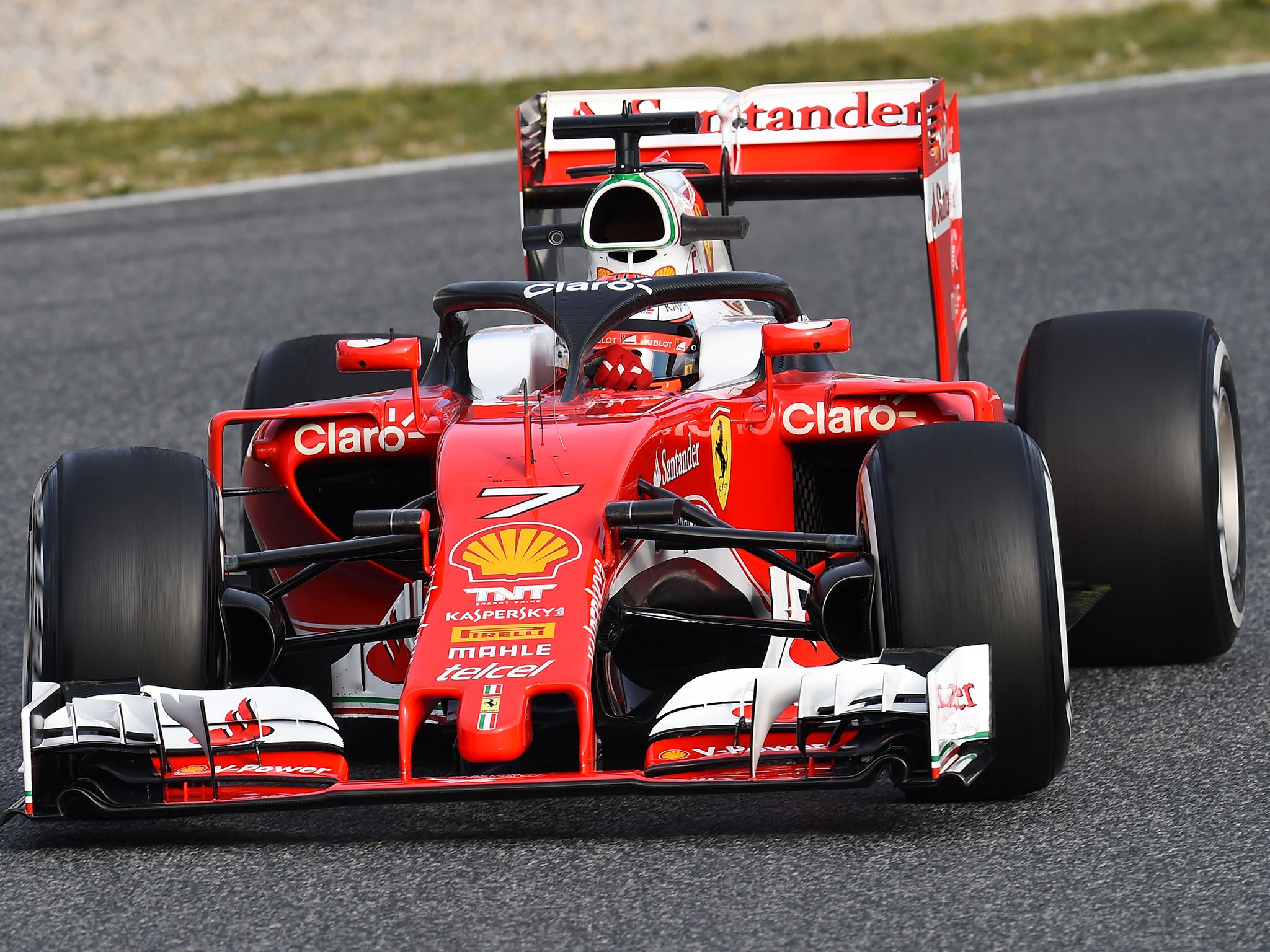 &#13;
Kimi Raikkonen tests the new 'Halo' design on his Ferrari during pre-season testing&#13;