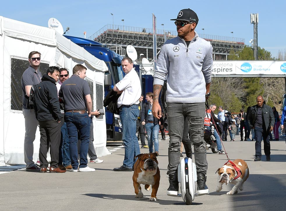 Lewis Hamilton arrives at the Barcelona circuit for pre-season testing