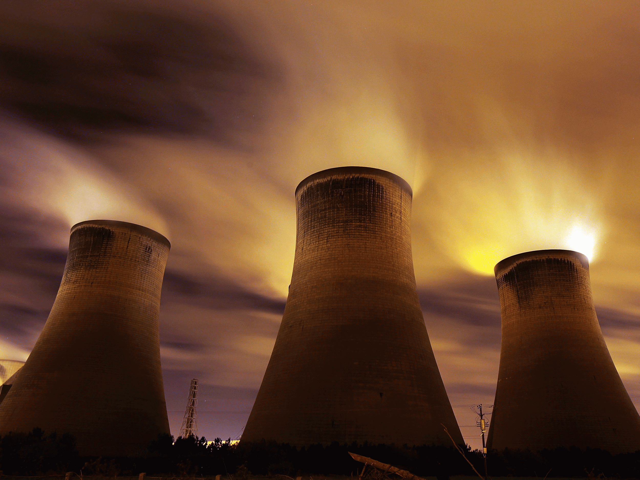 Cooling towers emit steam at the coal-fueled Fiddlers Ferry power station in Warrington