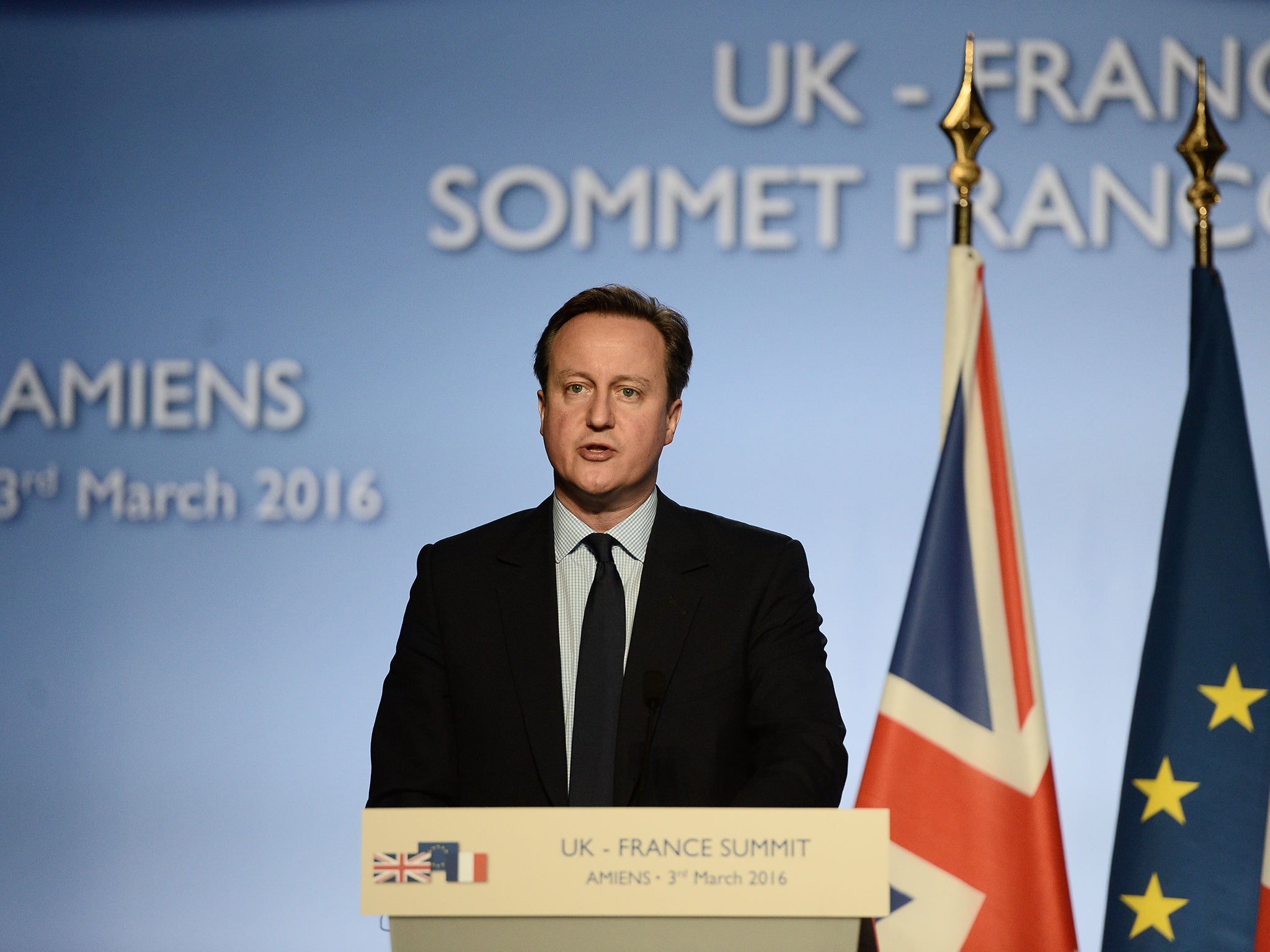 David Cameron gives a press conference at the Musee de Picardie in Amiens, northern France, during the 34th Franco-British summit.