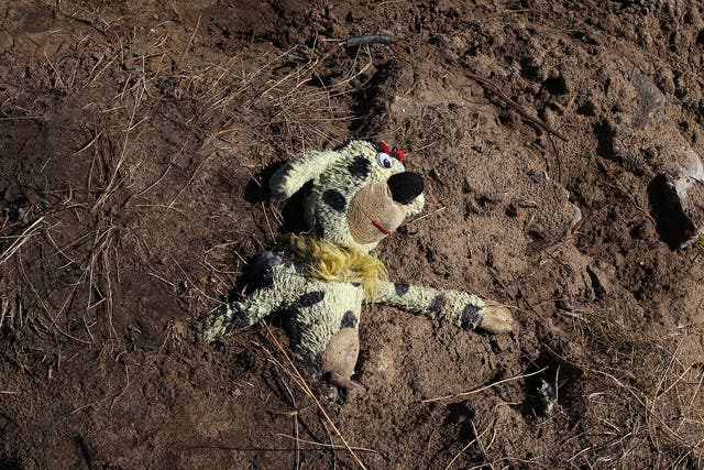 A child’s stuffed bear lies abandoned at the Jungle in Calais as French authorities move to clear the camp.
