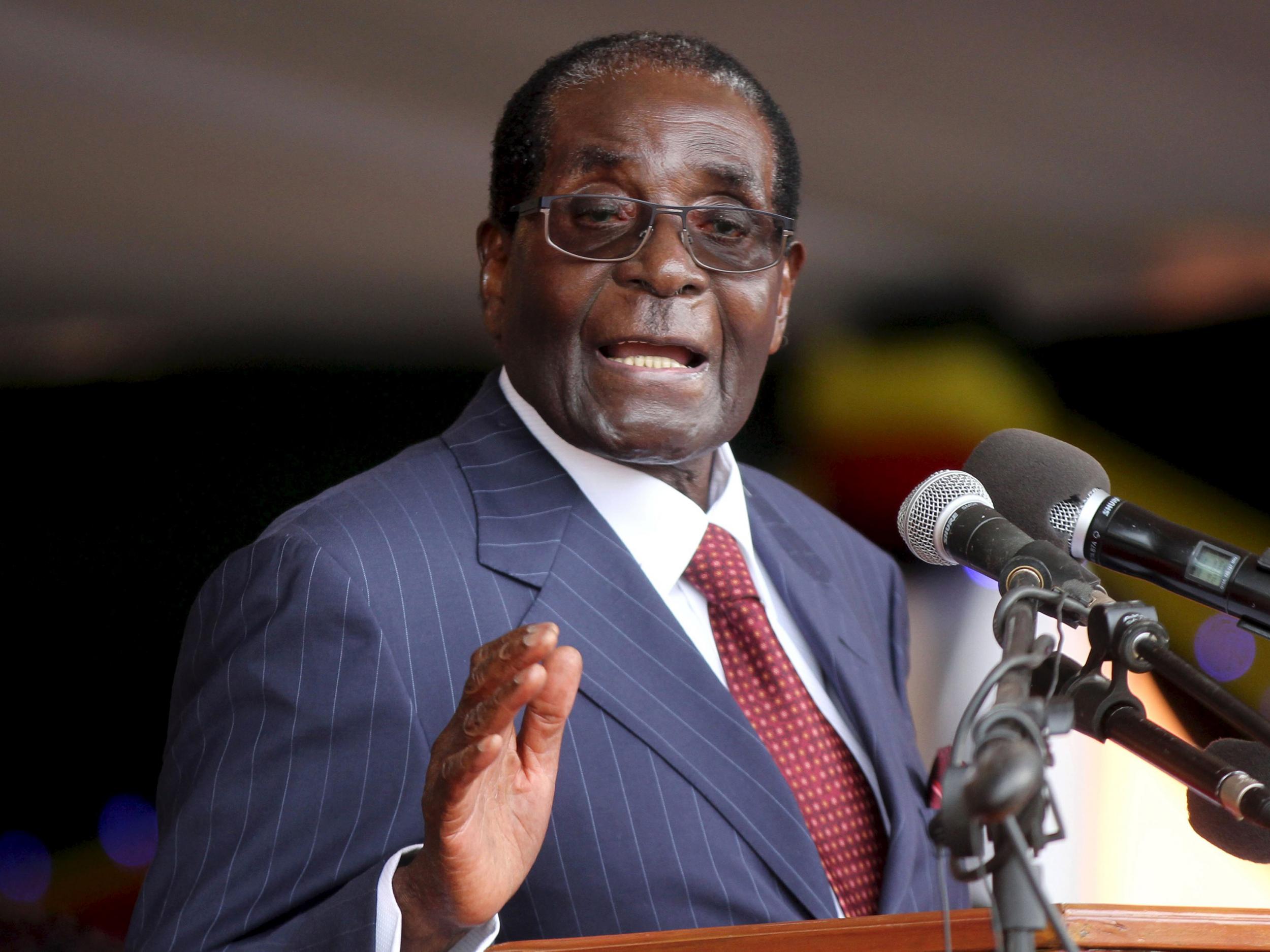 Image result for Mugabe Will Continue Living in Zimbabwe, Spokesman Says