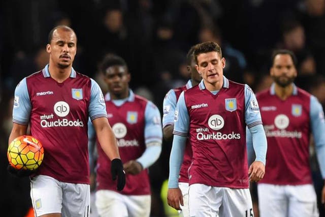 Gabriel Agbonlahor and Ashley Westwood of Aston Villa show their frustration after Everton's third goal