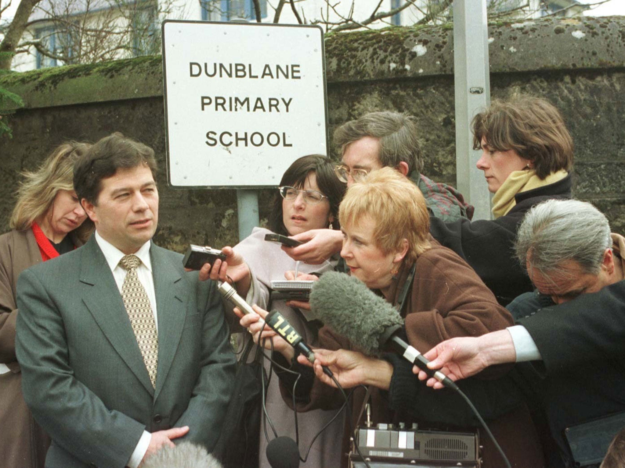Dunblane Primary School head teacher Ron Taylor speaking to reporters on the day pupils returned following the Dunblane massacre, 22 March 1996