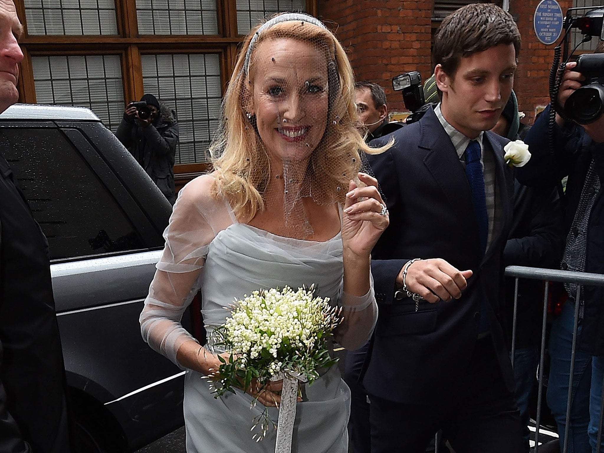 Jerry Hall arrives at St Bride's for the ceremony to celebrate her marriage to Rupert Murdoch