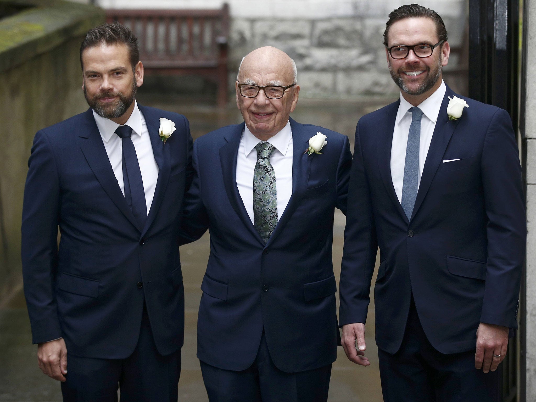 Rupert Murdoch with his sons Lachlan, left and James, right