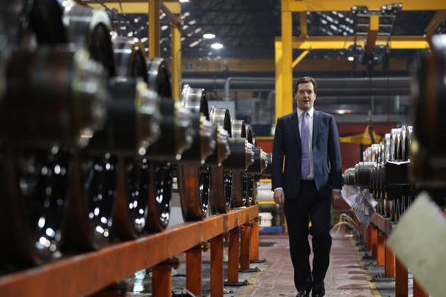 Chancellor George Osborne takes part in a tour of the train wheel manufacturers Lucchini UK, in Manchester, in 2013.  The first phase of HS2 opens in 2026