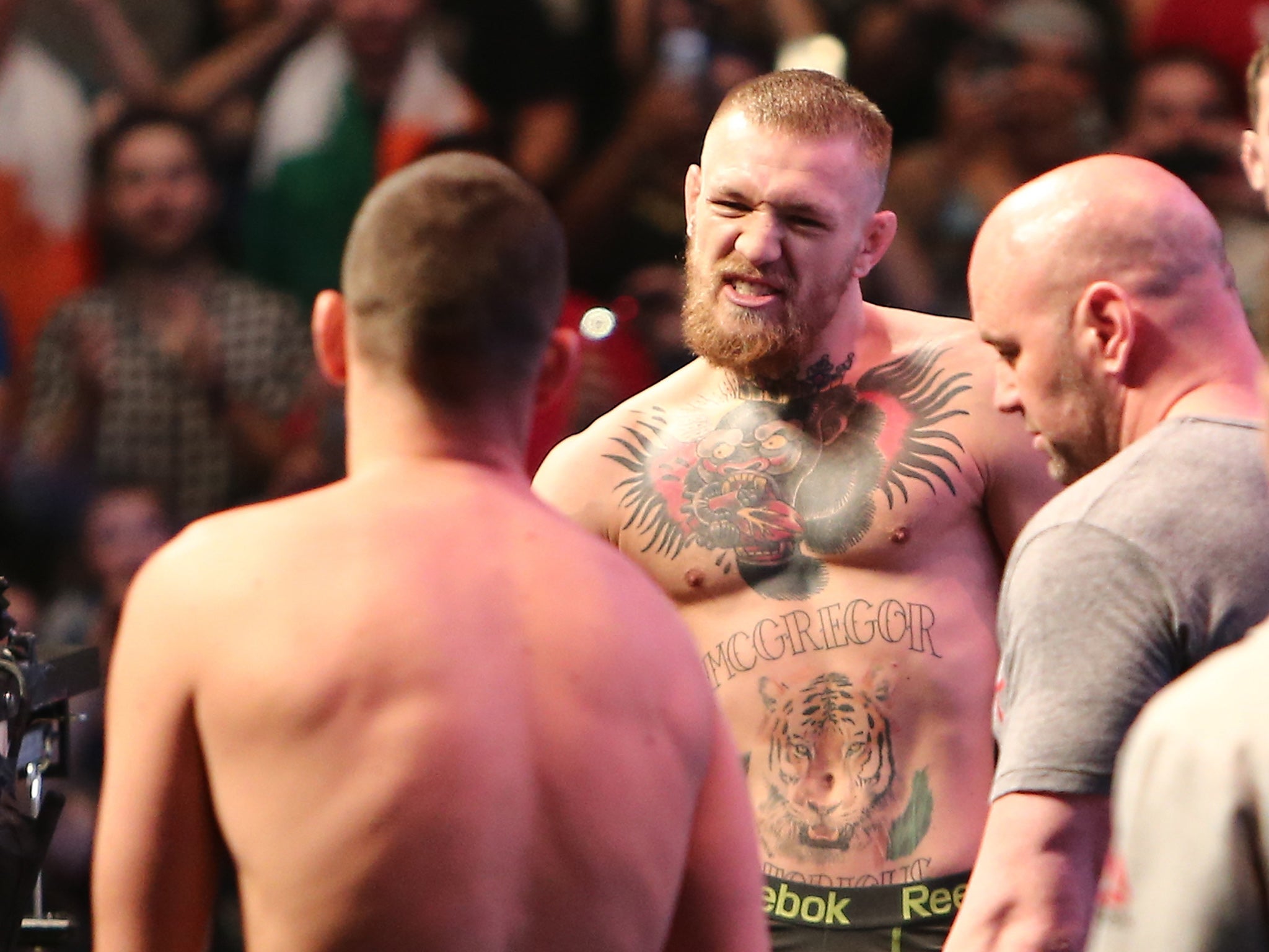 Conor McGregor and Nate Diaz face off at Friday's weigh-in