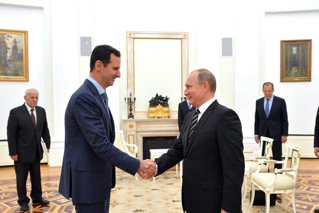 Vladimir Putin greets Bashar al-Assad ahead of a meeting at the Kremlin in October last year. Turkey and Russia have supported opposing sides in the Syrian conflict since the uprising began in 2011