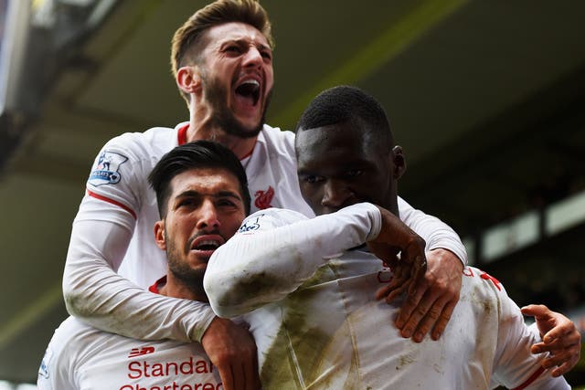 Christian Benteke (right) is mobbed after scoring the winning goal
