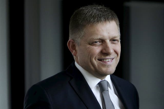Slovakia's Prime Minister and leader of Smer party Robert Fico leaves after a live broadcast of a debate after the country's parliamentary election, in Bratislava, Slovakia
