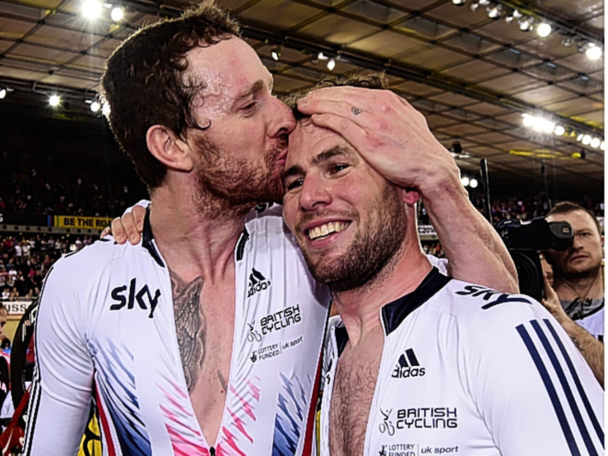 Bradley Wiggins and Mark Cavendish celebrate their success